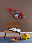 DIY wall shelf, chair with book and children's stool
