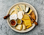 Cheese Plate with different types of cheese Snack assortment on plate