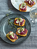 Crackers with beetroot pesto