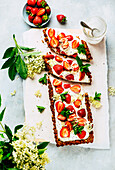 Strawberry tart with elderflower cream