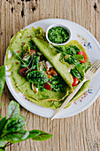 Spinach crepes with halloumi