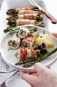 Chicken roulades with asparagus stuffing and bacon