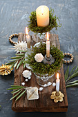 DIY Advent arrangement with real moss in a crystal glass