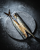 Smoked mackerel on the stone plate
