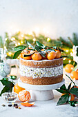 Tangerine pistachio cake with cream cheese and pistachios