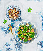 Broad bean salad with croutons