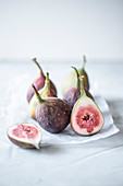 Whole and halved fresh figs