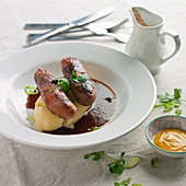 Bangers and mash with red wine gravy