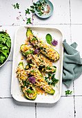 Stuffed zucchini with orzo noodles and corn