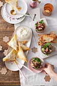 Salmon samosa with oriental aubergine salad