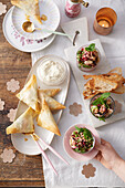 Salmon samosas with oriental aubergine salad