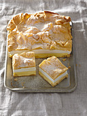 Cloud pastry cake with yolk cream and whipped cream