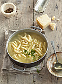 Cheese passatelli in broth