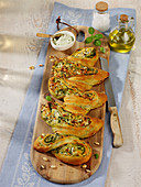 Filled wheat bread with zucchini, ricotta and pine nuts