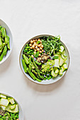 Lemon quinoa bowl with green vegetables