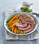 Roast veal with caramelized carrots