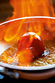 Flambéed, jellied tomato