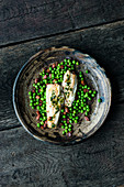 Plaice fillet with bacon and peas and gremolata