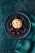 Kaiserschmarren (shredded sugared pancake from Austria) soufflé with pear and blackberry compote