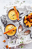 Sweet potato soup with toasted bread sticks