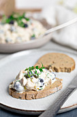 Chicken salad with leek, carrots, blueberries and mayonnaise on bread