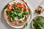 Salmon wrap with spinach and sour cream
