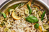 One-pot pasta with leek, courgette and sugar snap peas