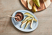 Chestnut and chocolate cream with pear wedges