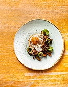Wild mushrooms, fried duck egg, brussels sprouts, walnut and truffle