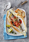 Baked mackerel with tomatoes and lime