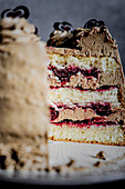 Mocha cake with sour cherries and red wine, cut