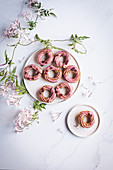 Pomegranate choux doughnuts with jasmine