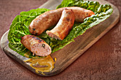 Roasted salmon sausages with green peppercorns