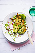 Stuffed courgette flowers with radish salad