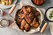 Chicken wings with dips and potatoe wedges