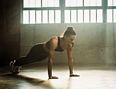 A woman performing pushups