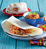 Burritos with chicken meat and rice