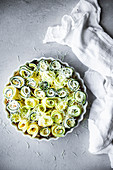 Courgette rolls with ricotto and lemon