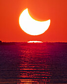 Solar eclipse at sunrise, 2019