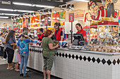 Customers at a candy store checkout, USA