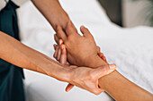 Ayurveda therapeutic arm massage with ethereal oil