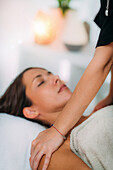 Ayurveda shoulder massage treatment with essential oils