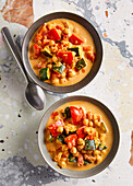 Vegan curry with chickpeas, peppers and courgettes