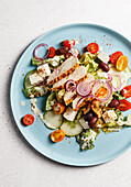 Gyros salad with feta cheese and olives