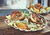 Grilled scallops on salad