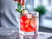 Watermelon punch with cucumber and rosemary