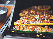 Grilled stuffed zucchini and summer squash