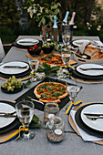 Table set with pizza outside