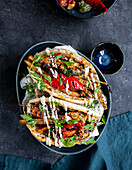 Vegetarian vegetable kebab with a sesame-and-garlic sauce