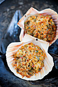 Crab meat au gratin served in clam shells